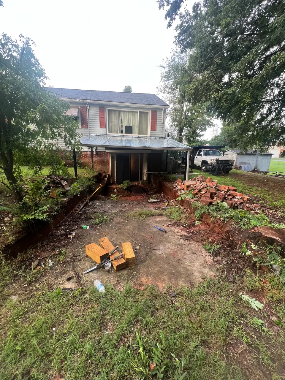 Backyard behind the home before renovation work began