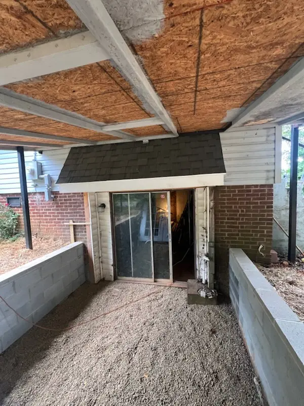 Backyard hangout area with the original sliding door still in place before replacement